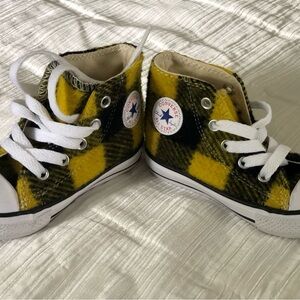 Converse Yellow and Black High-Top Sneakers